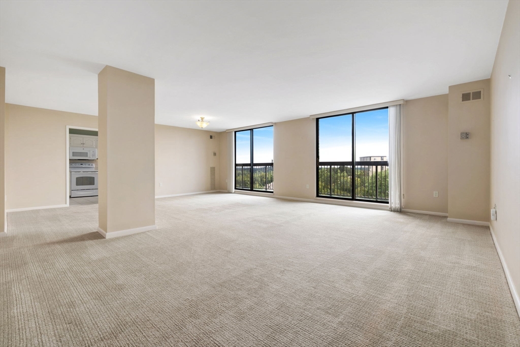 40 Village Road, Unit 1601 Middleton, MA 01949 - Photo 10 of 38 a view of an empty room with a window