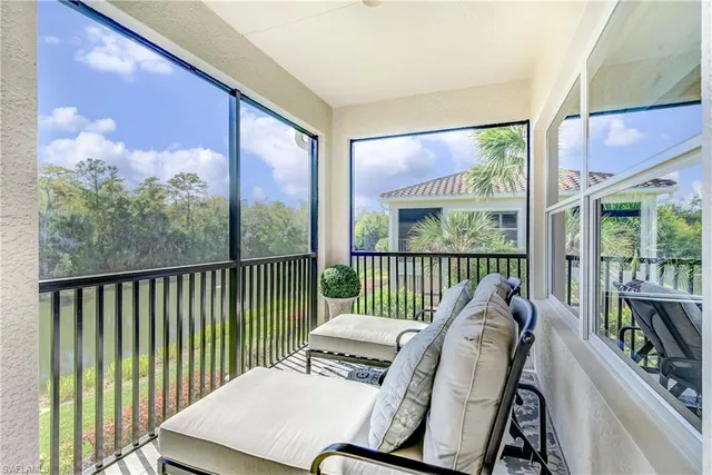 a view of a balcony with wooden floor