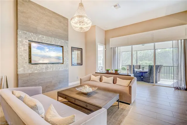 a living room with furniture and a table