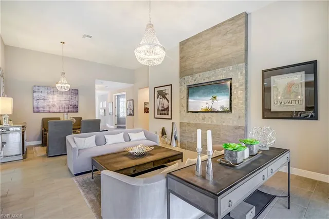 a living room with furniture and a table