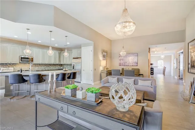 a view of kitchen with dining table and chairs