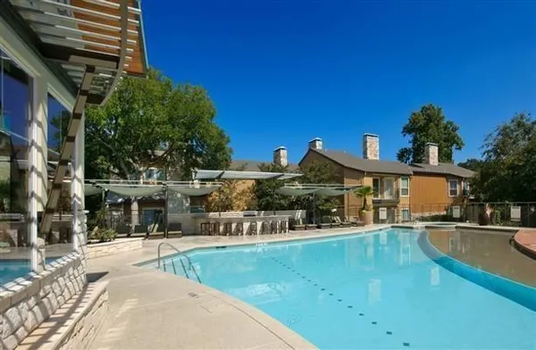a view of a house with a swimming pool