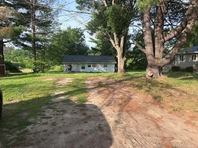 18480 12 Mile Road Big Rapids, MI 49307 - Photo 3 of 5 looking down driveway
