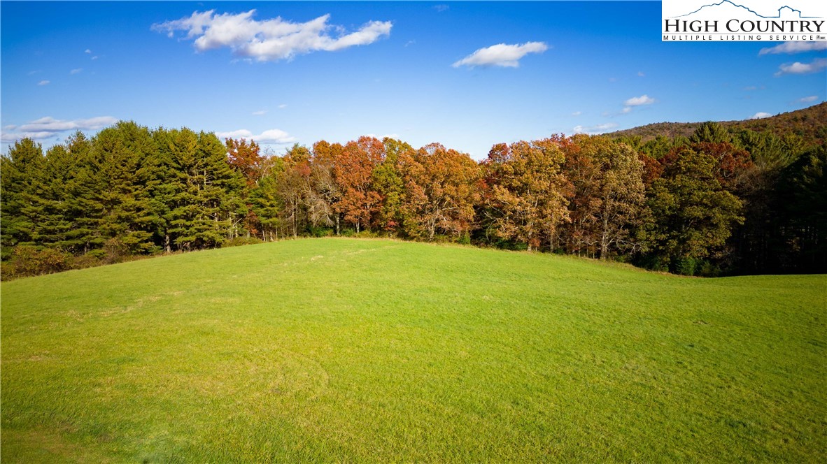 498 Saddle View Road Ennice, NC 28623 - Photo 13 of 50 a view of a field with an ocean