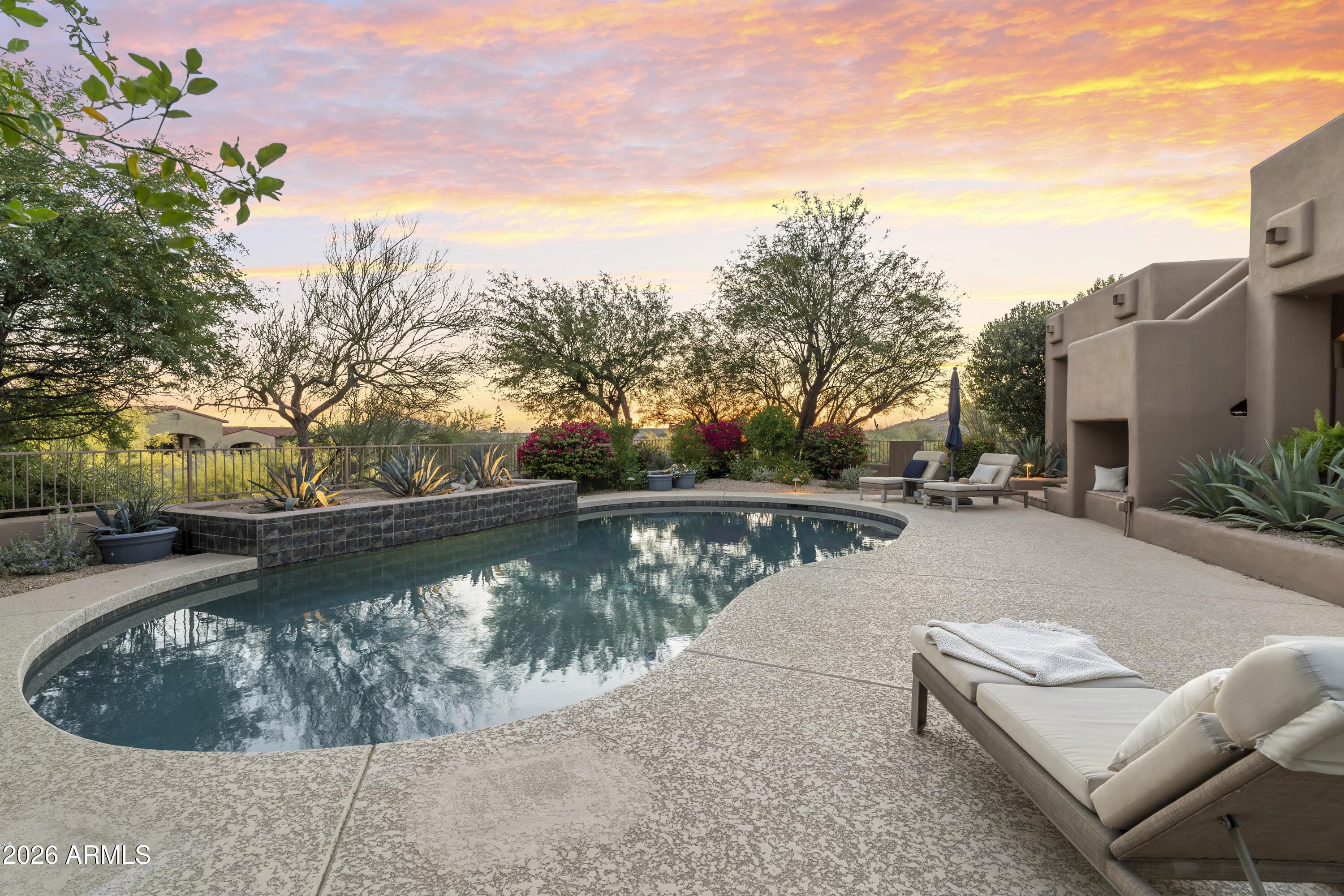 10046 East Hidden Valley Road Scottsdale, AZ 85262 - Photo 42 of 64 a view of swimming pool with a yard
