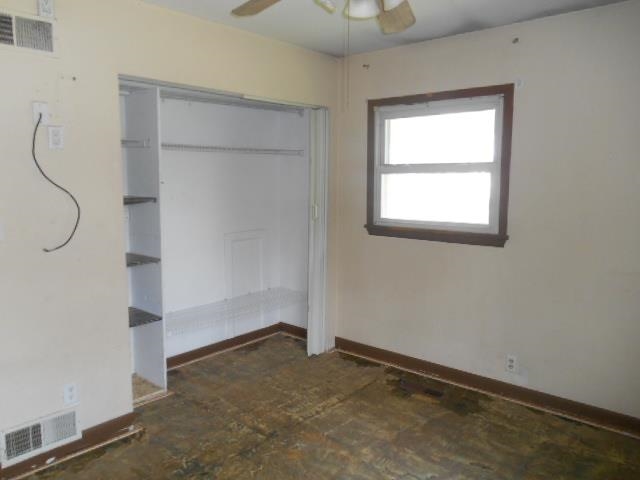 424 North 10th Street Rochelle, IL 61068 - Photo 12 of 22 an empty room with a window