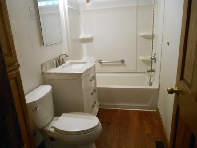 424 North 10th Street Rochelle, IL 61068 - Photo 15 of 22 a bathroom with a toilet and a sink