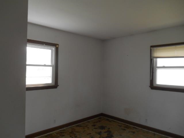 424 North 10th Street Rochelle, IL 61068 - Photo 22 of 22 an empty room with a window