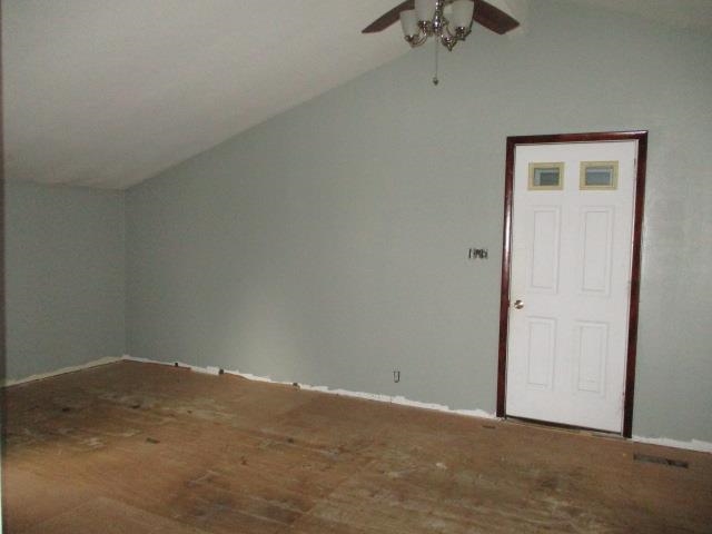 424 North 10th Street Rochelle, IL 61068 - Photo 6 of 22 an empty room with a chandelier fan