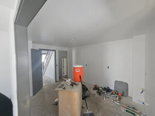 a view of a workspace with furniture