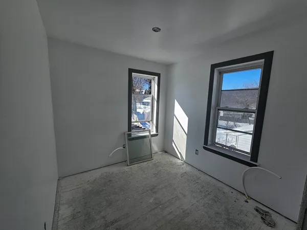 a bathroom with a granite countertop toilet sink and shower