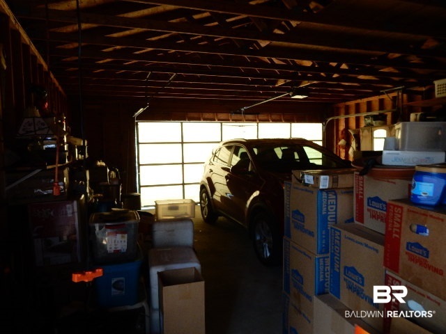 1556 Valencia Drive Lillian, AL 36549 - Photo 25 of 28 Inside garage