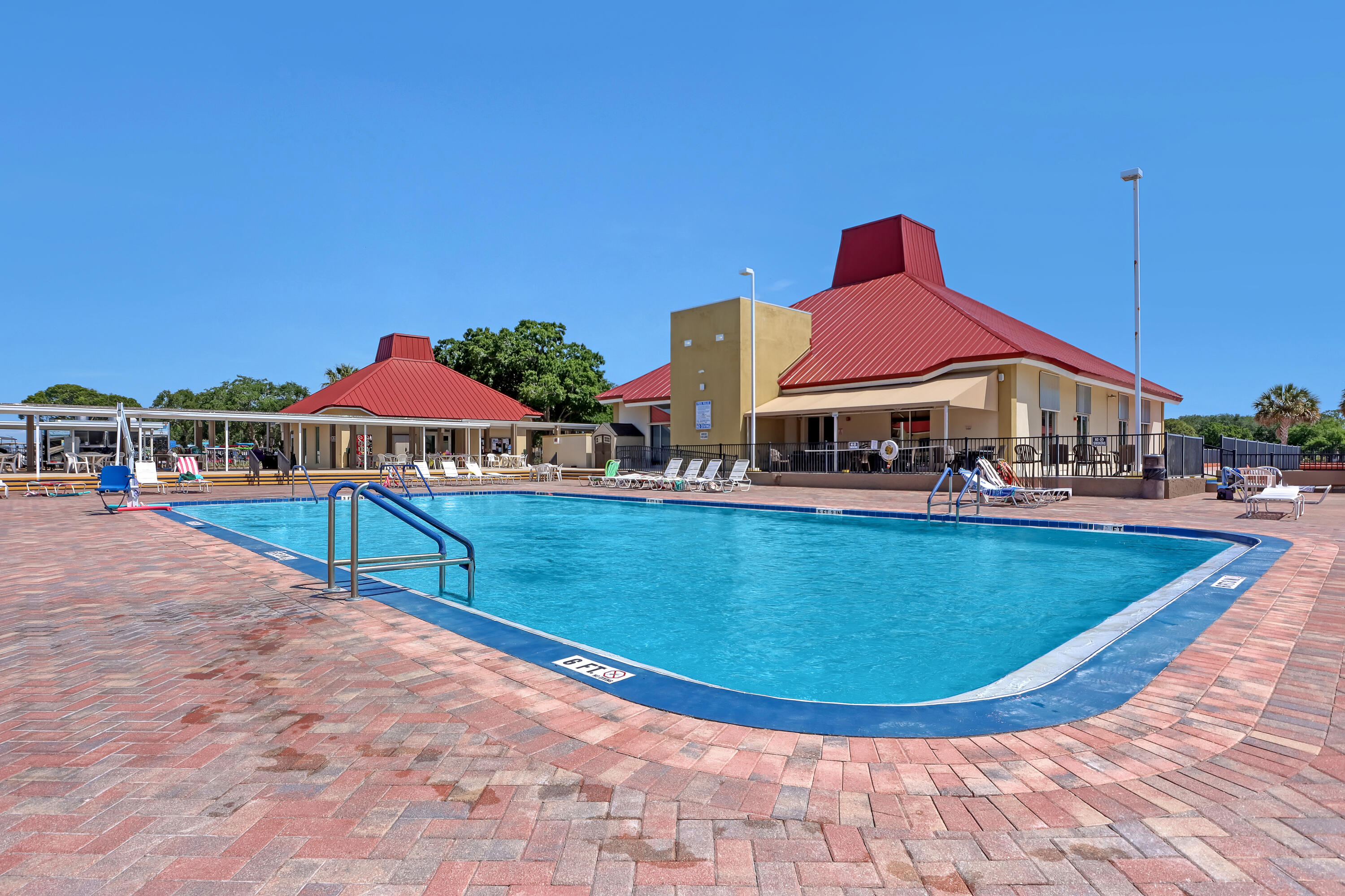 464 Dolphin Circle Barefoot Bay, FL 32976 - Photo 33 of 42 a view of a house with swimming pool