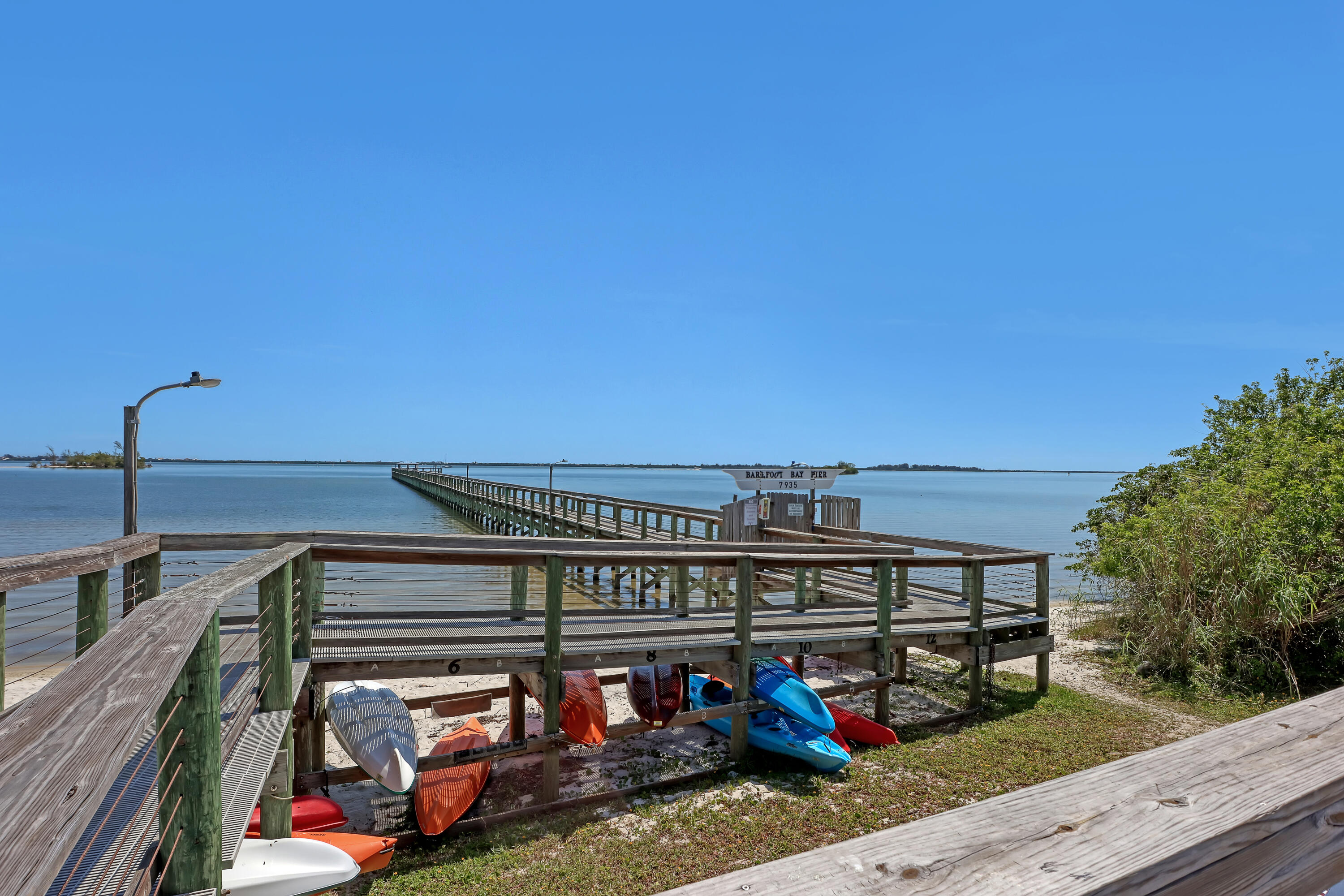 464 Dolphin Circle Barefoot Bay, FL 32976 - Photo 41 of 42 a view of a city from a balcony