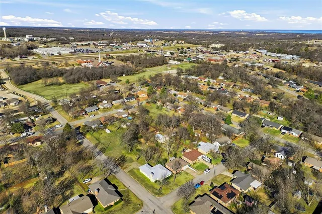 an aerial view of residential building with parking space