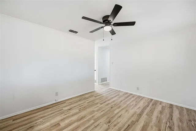 a view of a big room with wooden floor