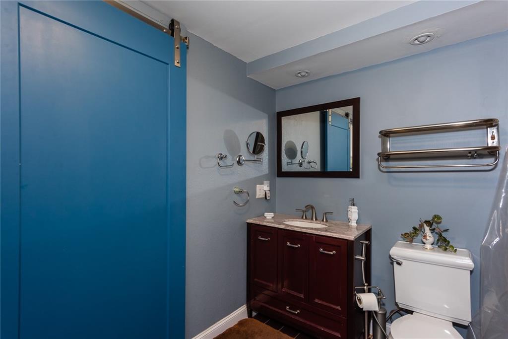 375 Ralph McGill Boulevard Northeast, Unit 1701 Atlanta, GA 30312 - Photo 24 of 33 a workspace with furniture and mirror