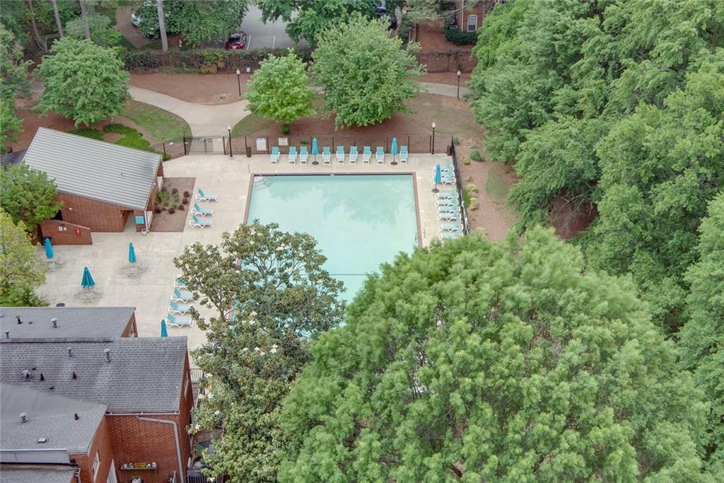 375 Ralph McGill Boulevard Northeast, Unit 1701 Atlanta, GA 30312 - Photo 32 of 33 an aerial view of a house with a yard and lake view