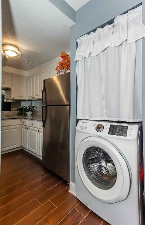375 Ralph McGill Boulevard Northeast, Unit 1701 Atlanta, GA 30312 - Photo 7 of 33 a kitchen with cabinets and stainless steel appliances