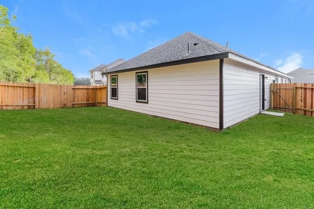 a view of a backyard with a garden