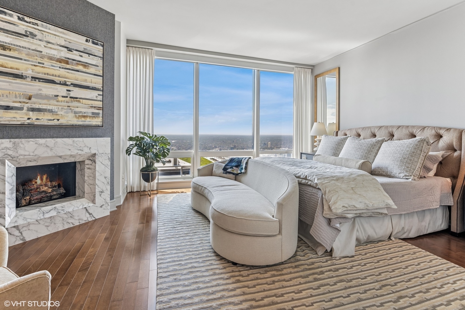 401 North Wabash Avenue, Unit 54E Chicago, IL 60611 - Photo 14 of 29 a living room with furniture and a fireplace