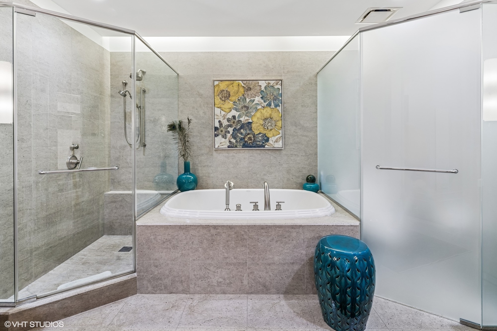 401 North Wabash Avenue, Unit 54E Chicago, IL 60611 - Photo 16 of 29 a bathroom with a tub a sink and glass door