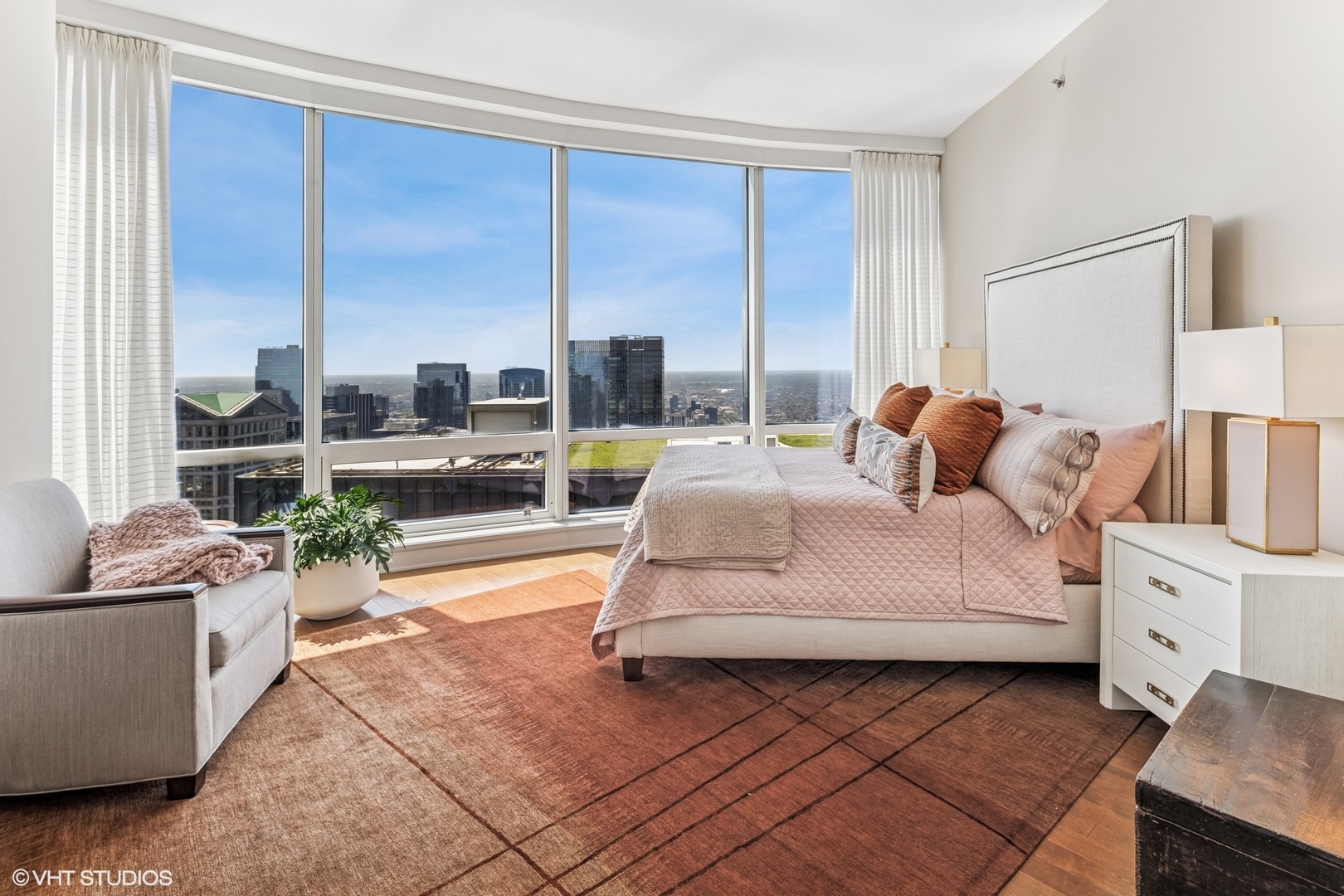 401 North Wabash Avenue, Unit 54E Chicago, IL 60611 - Photo 20 of 29 a living room with furniture and a large window
