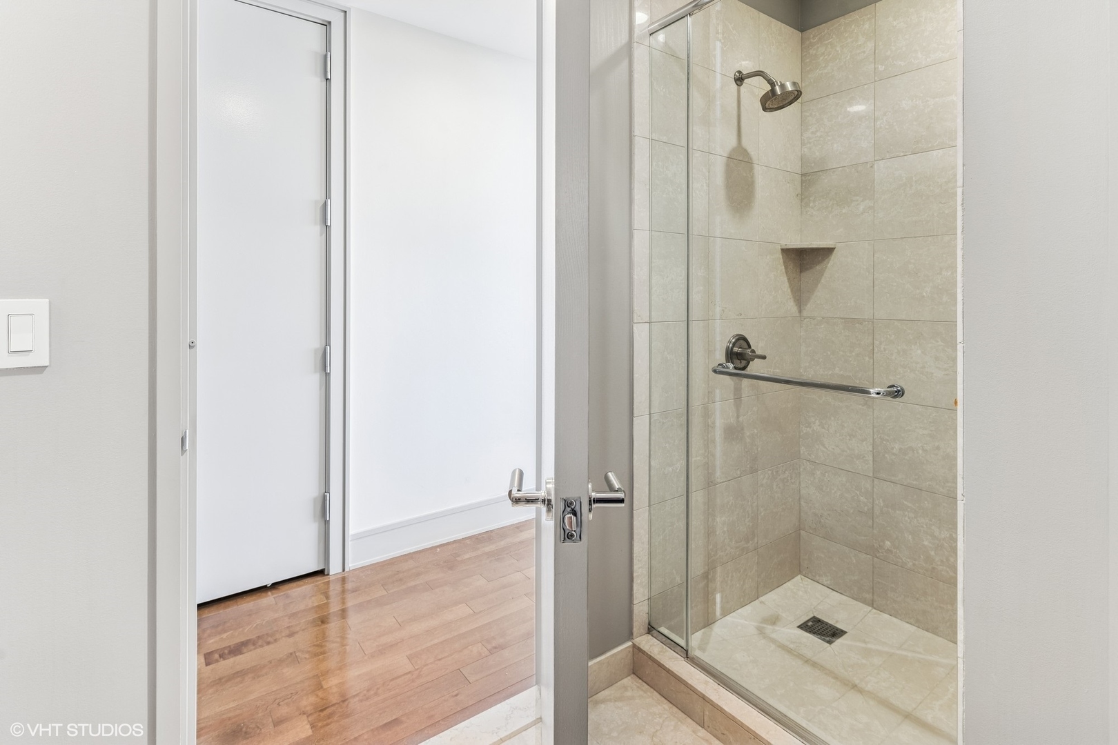 401 North Wabash Avenue, Unit 54E Chicago, IL 60611 - Photo 22 of 29 a bathroom with a shower