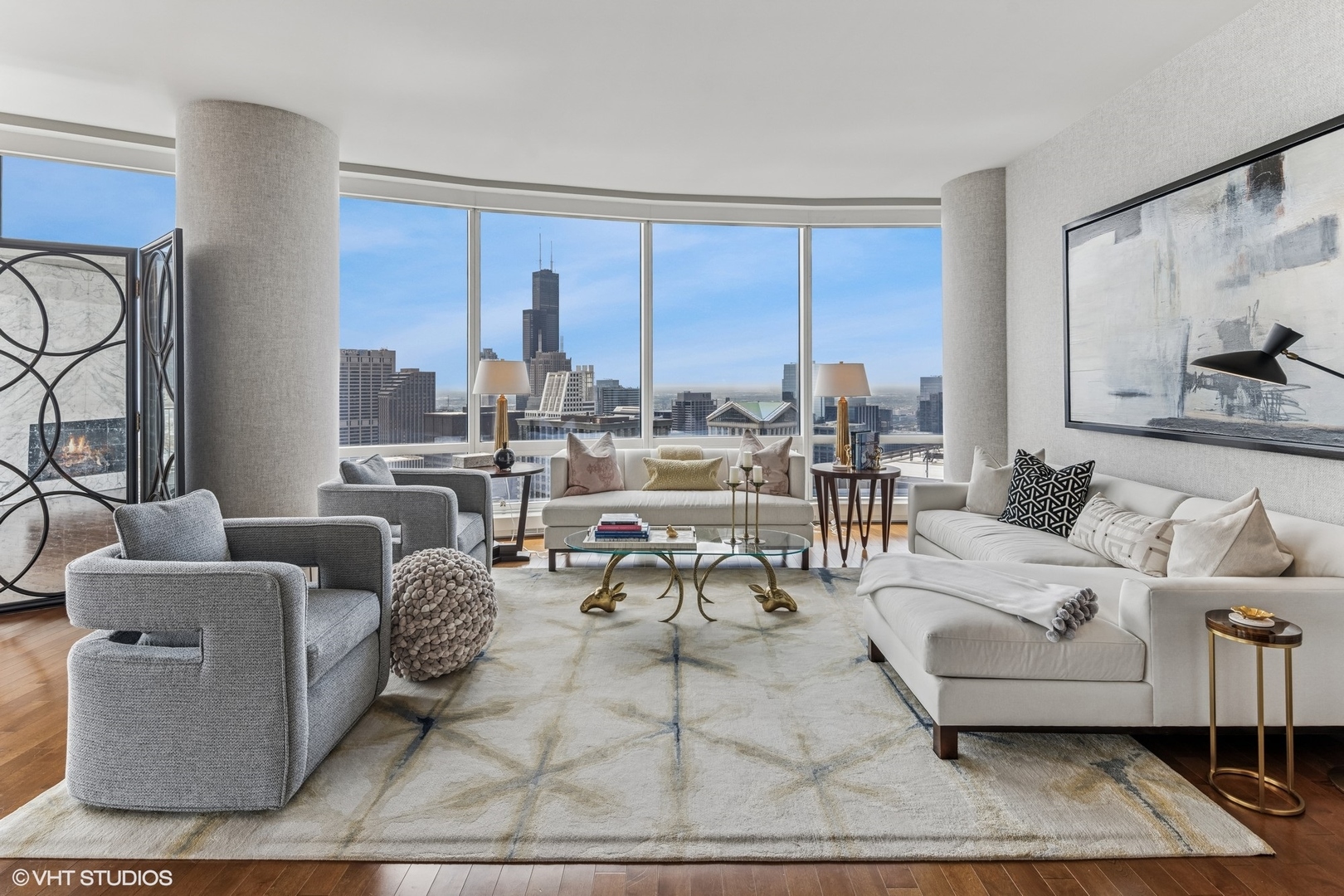 401 North Wabash Avenue, Unit 54E Chicago, IL 60611 - Photo 4 of 29 a living room with furniture and large windows