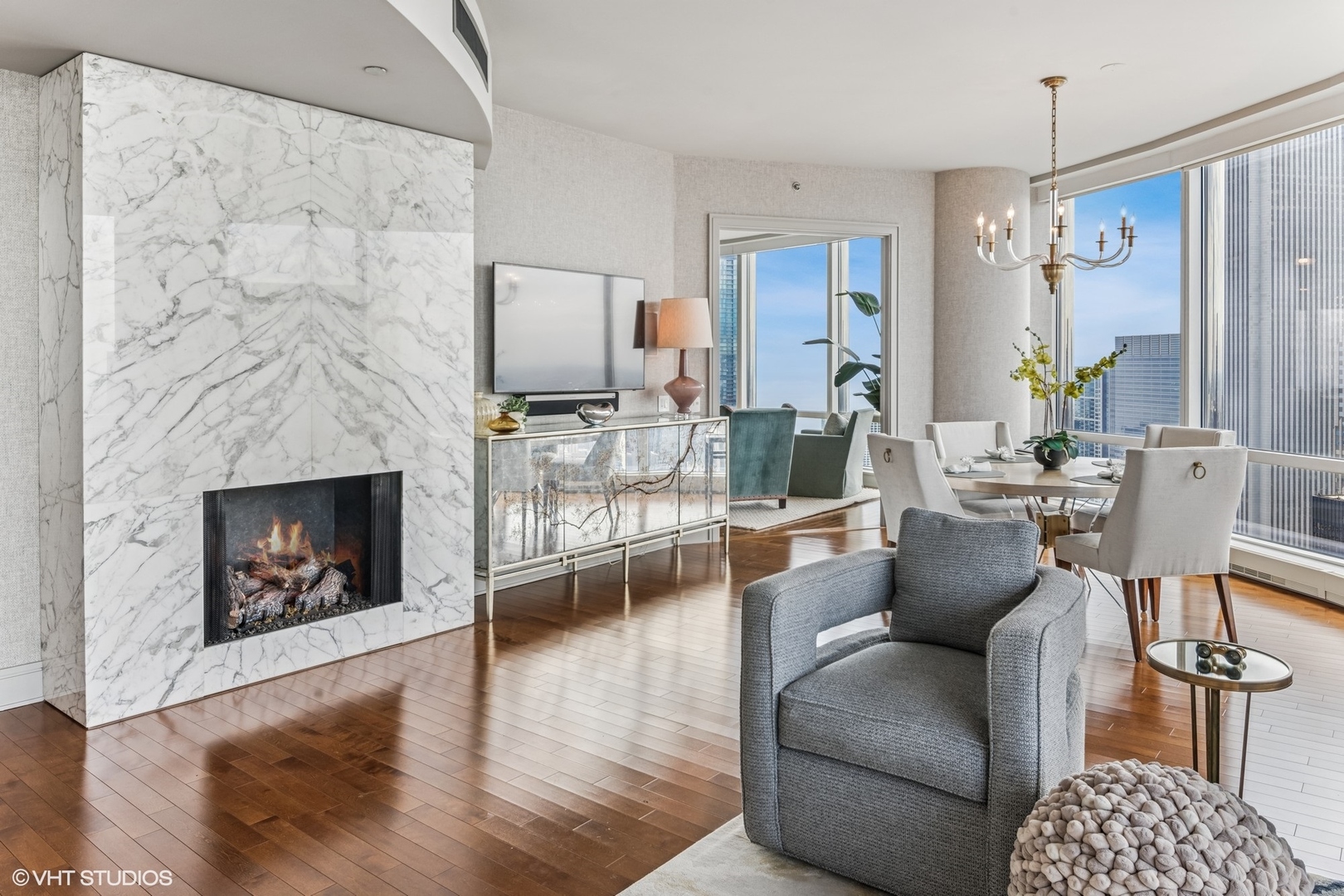 401 North Wabash Avenue, Unit 54E Chicago, IL 60611 - Photo 6 of 29 a living room with furniture and a fireplace