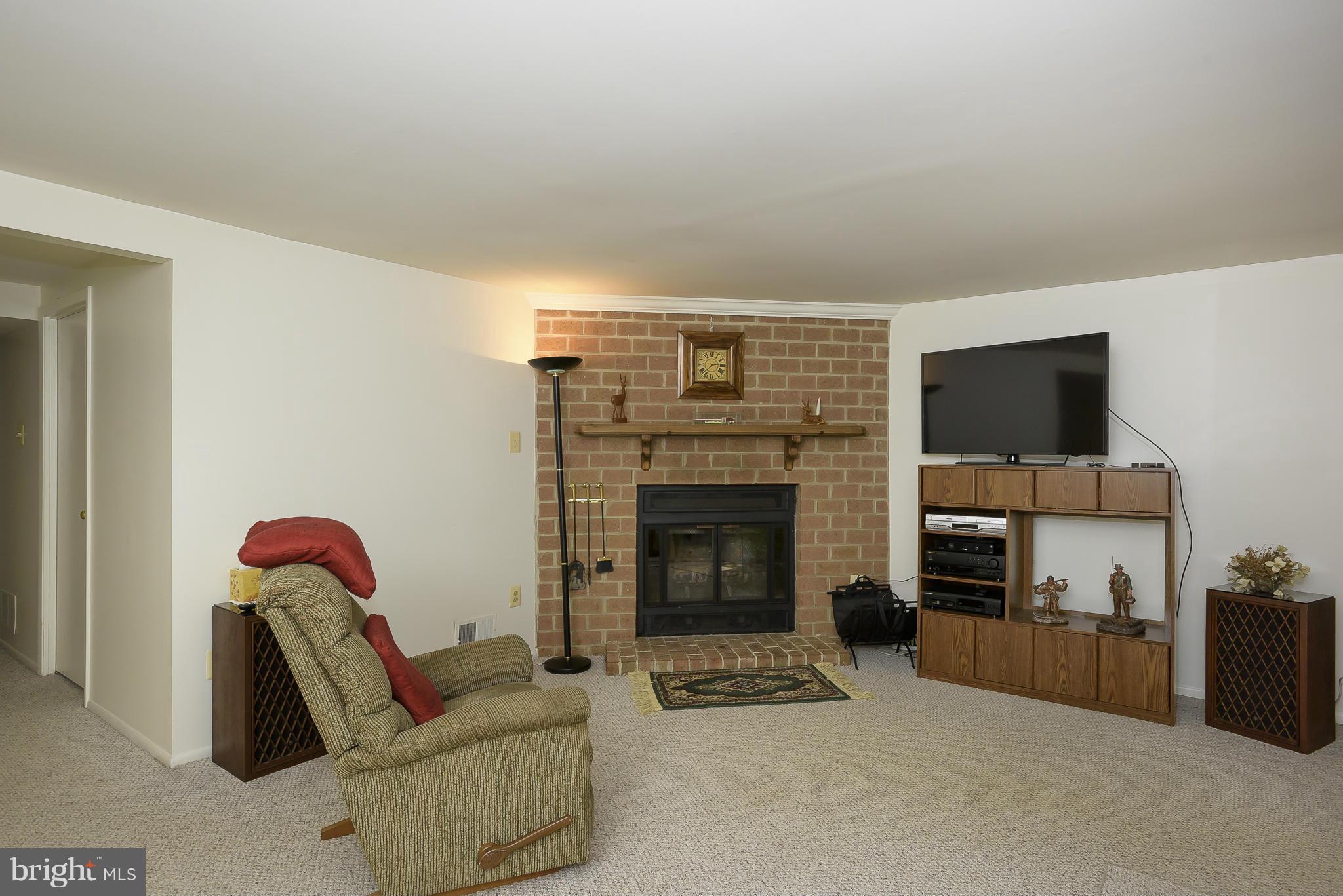 10522 East Wind Way Columbia, MD 21044 - Photo 20 of 26 Family Room, cozy wood burning fireplace