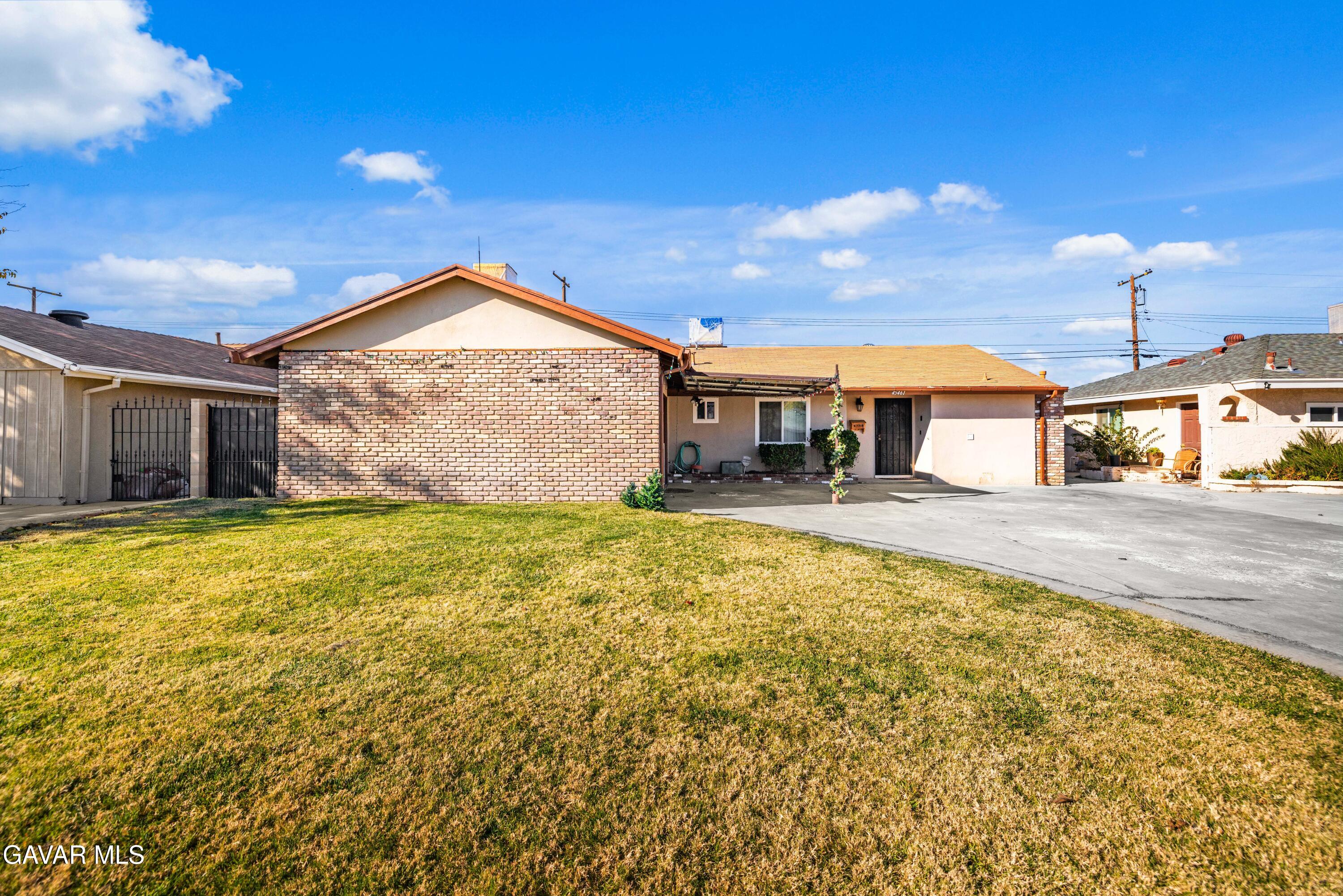 a front view of house with yard