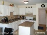 24263 Weathervane Court, Unit 9 Novi, MI 48374 - Photo 4 of 12 weathervane kitchen.jpg