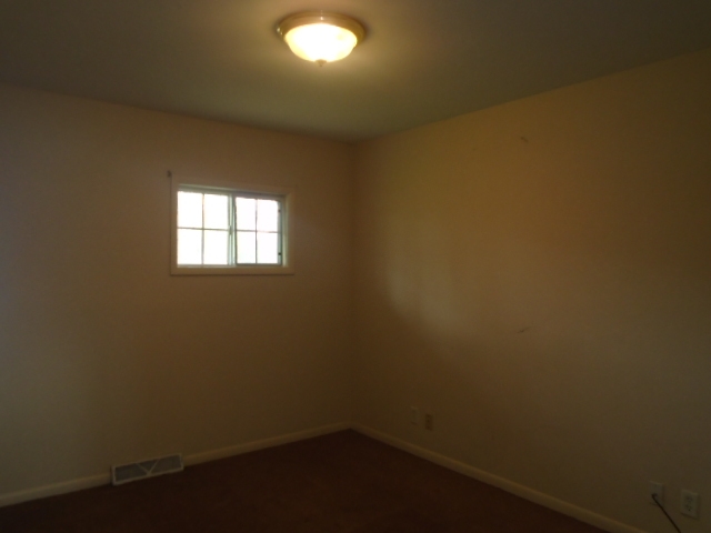 2120 South Alpine Road Rockford, IL 61108 - Photo 6 of 12 an empty room with windows