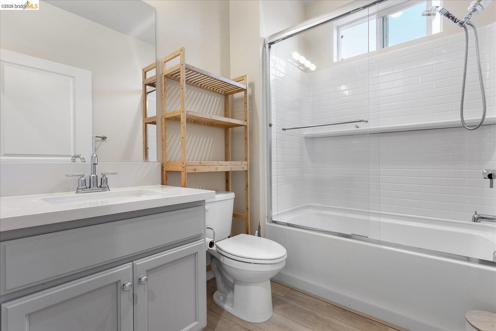 5601 Ridgepoint Way Antioch, CA 94531 - Photo 24 of 59 Bathroom featuring a light gray vanity with a white countertop and rectangular sink