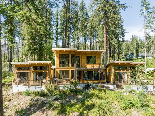 aerial view of a house with swimming pool and sitting area