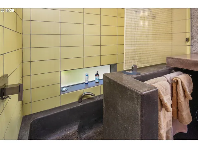 a bathroom with a sink and a vanity
