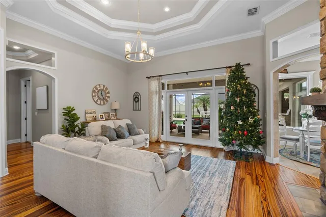 a bathroom with a sink a mirror a vanity and a window