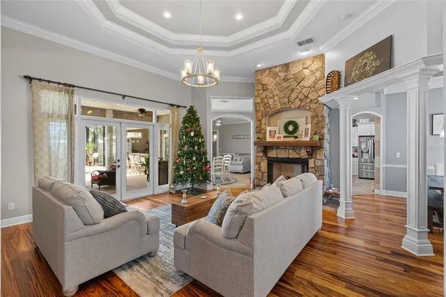 a spacious bathroom with a sink and a mirror