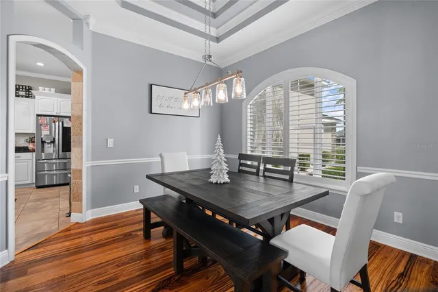 a view of walk in closet with clothes