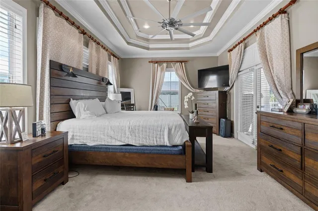 a bathroom with a granite countertop sink a mirror and a shower