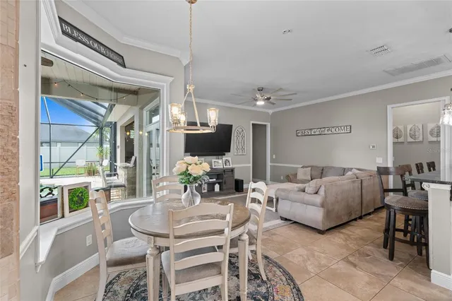 a view of a livingroom with furniture and a flat screen tv