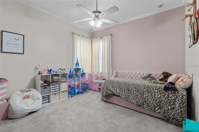 an aerial view of residential houses with outdoor space and city view