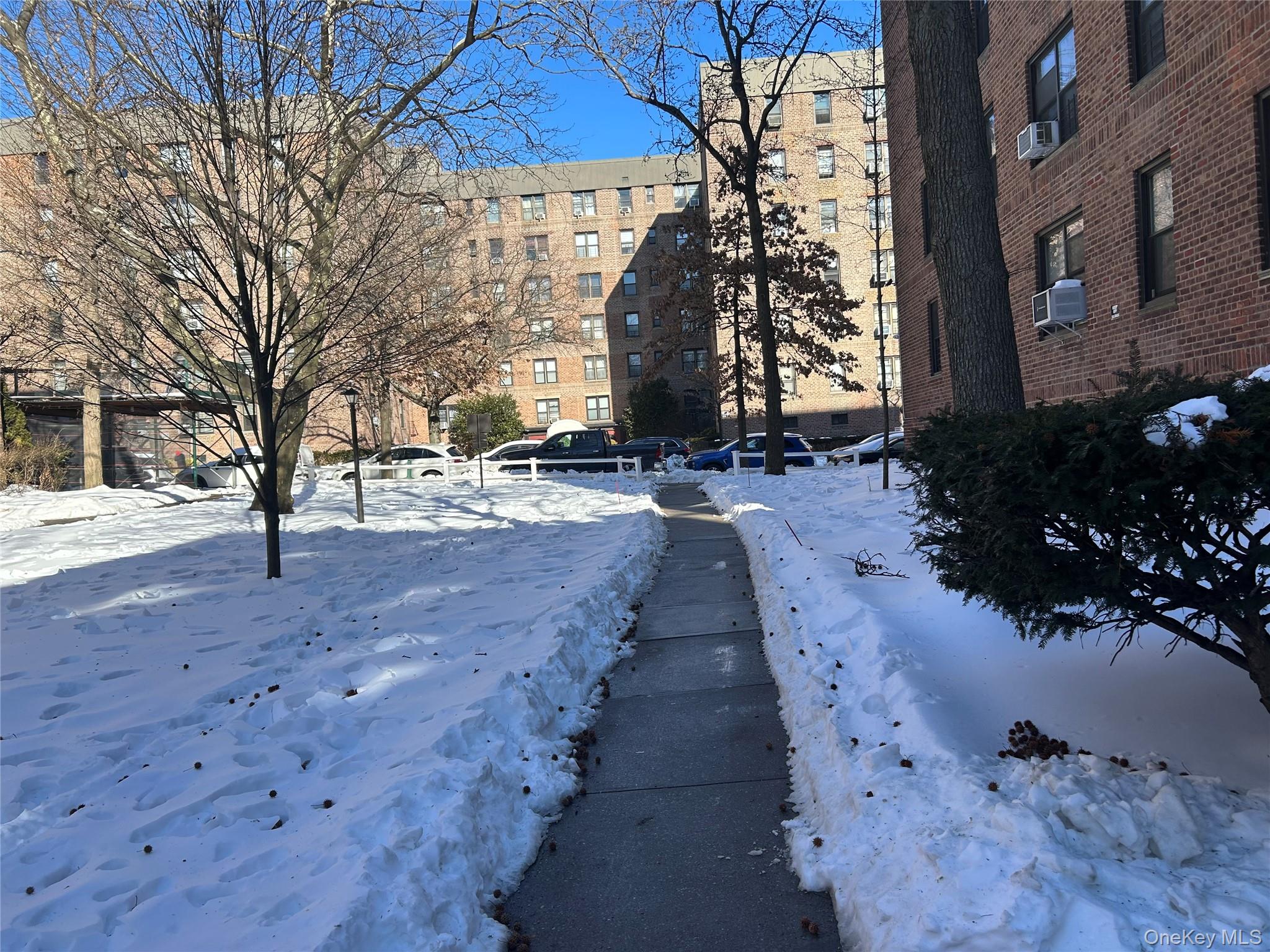 83-20 98th Street, Unit 5J Queens, NY 11421 - Photo 5 of 17 a view of a pathway with a yard