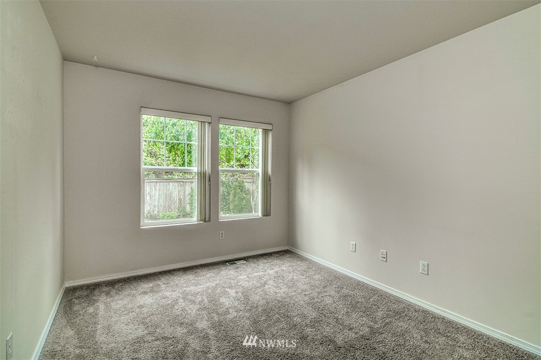 2402 Southeast 2nd Place Renton, WA 98056 - Photo 18 of 40 an empty room with a window