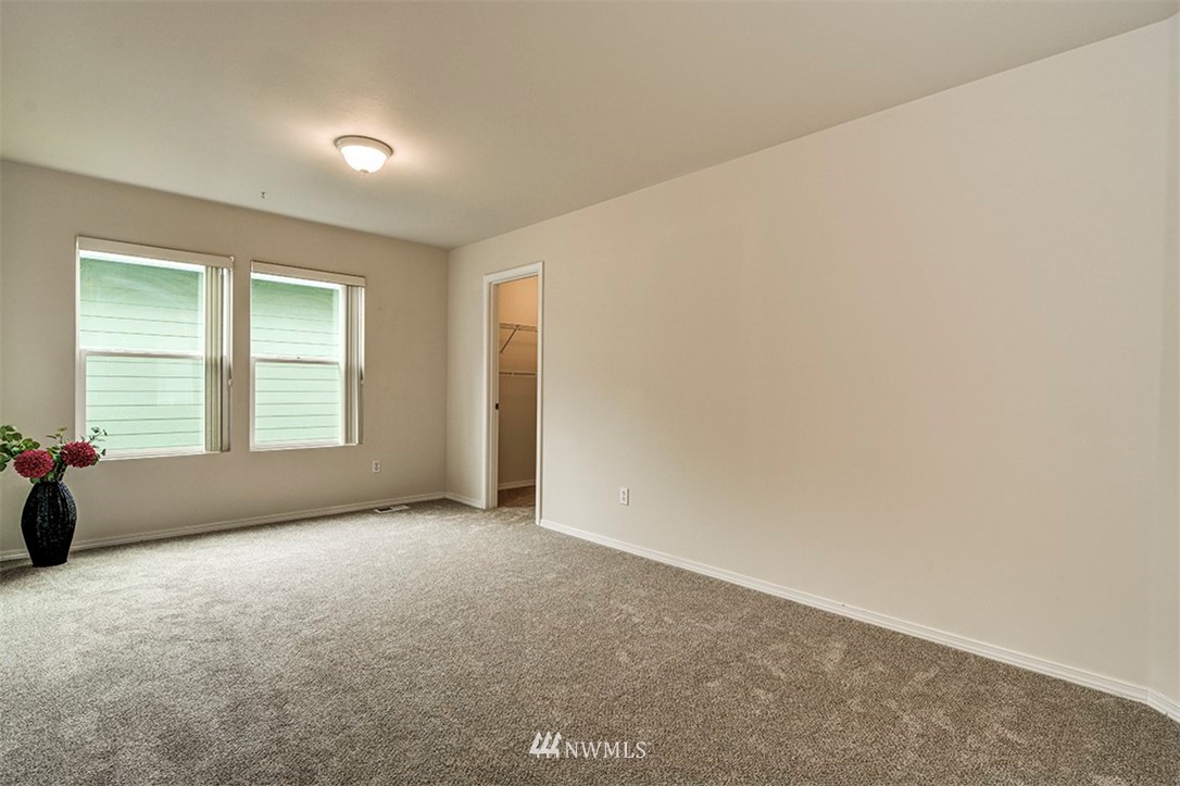 2402 Southeast 2nd Place Renton, WA 98056 - Photo 21 of 40 an empty room with windows