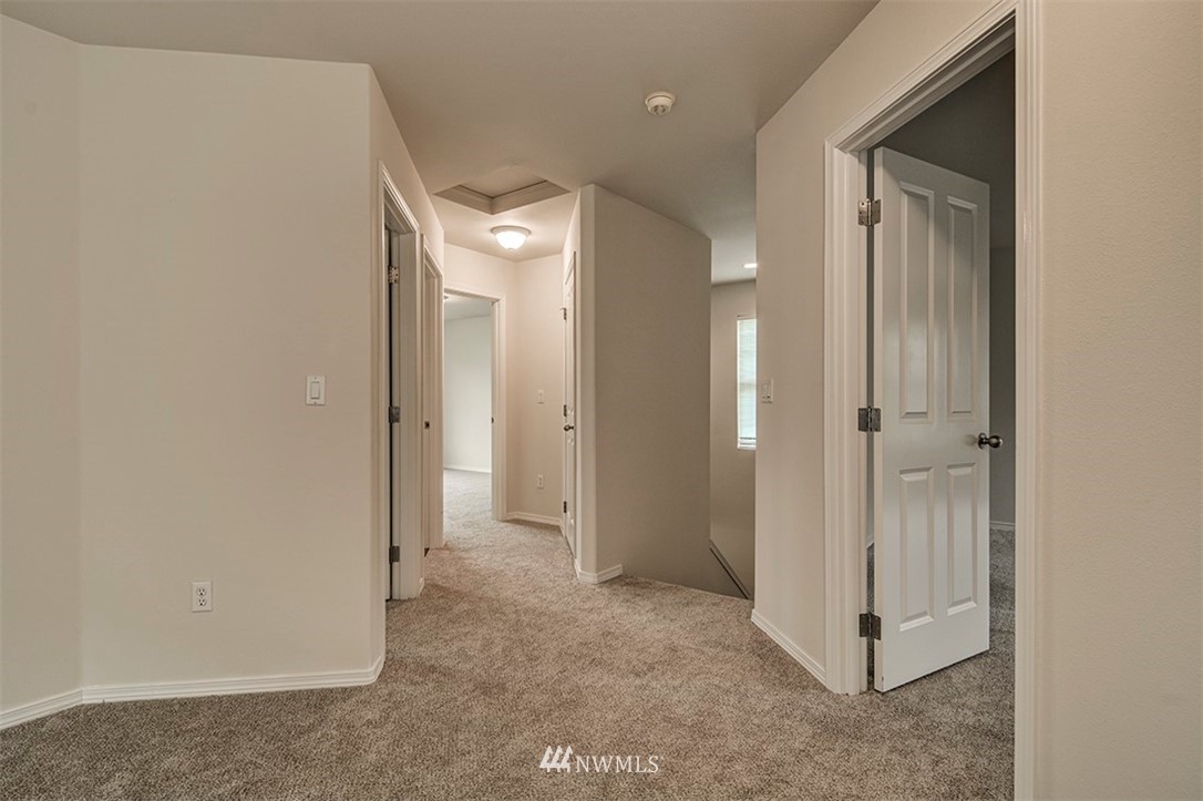 2402 Southeast 2nd Place Renton, WA 98056 - Photo 23 of 40 an empty room with closet and a bathroom