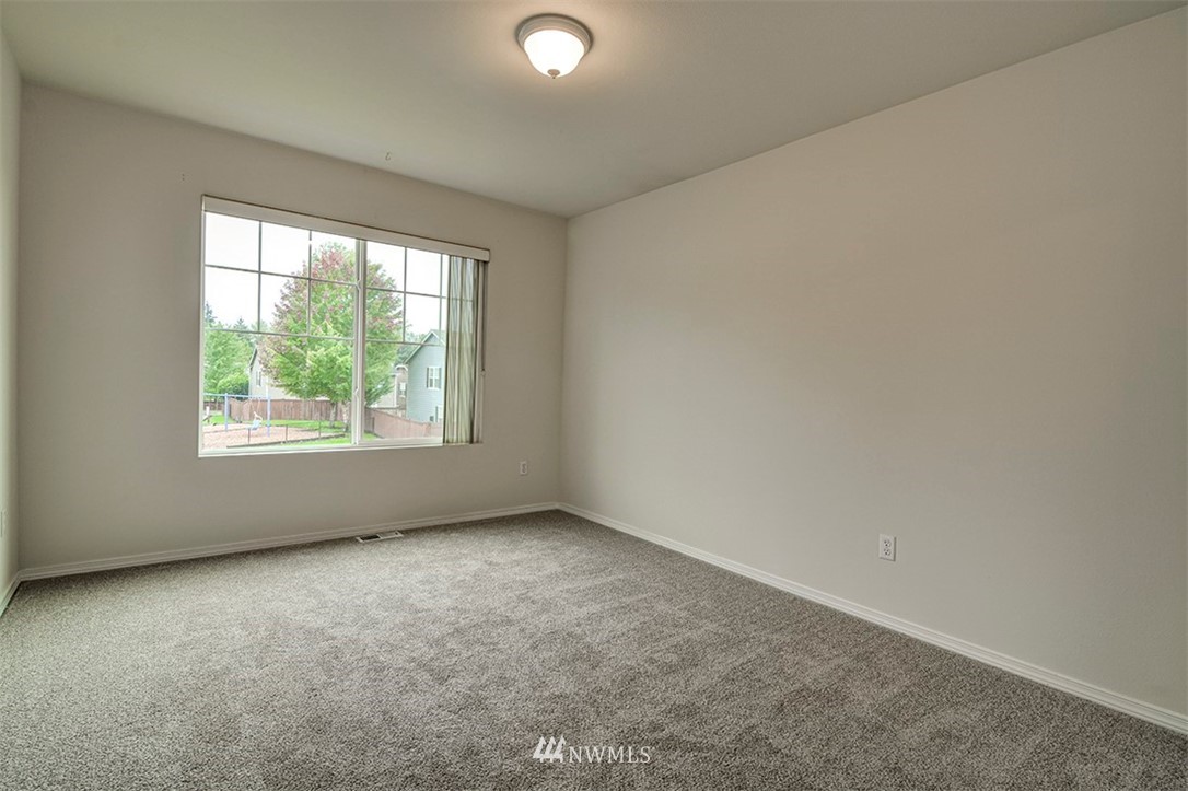 2402 Southeast 2nd Place Renton, WA 98056 - Photo 30 of 40 an empty room with a window