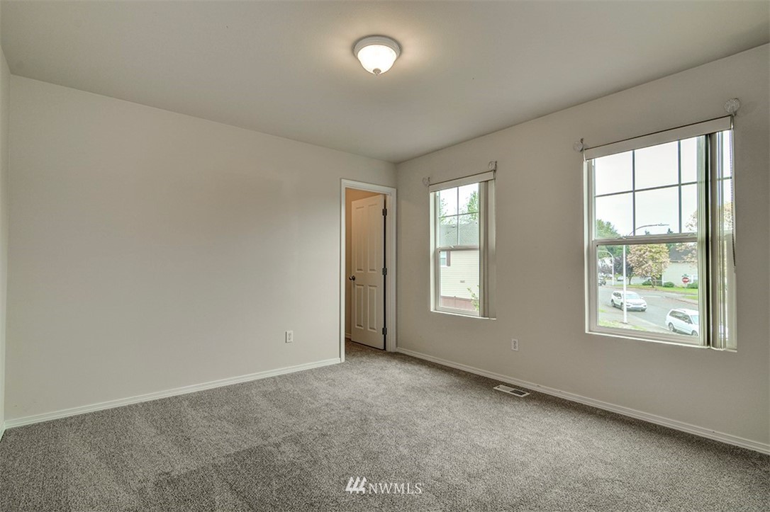 2402 Southeast 2nd Place Renton, WA 98056 - Photo 31 of 40 an empty room with windows