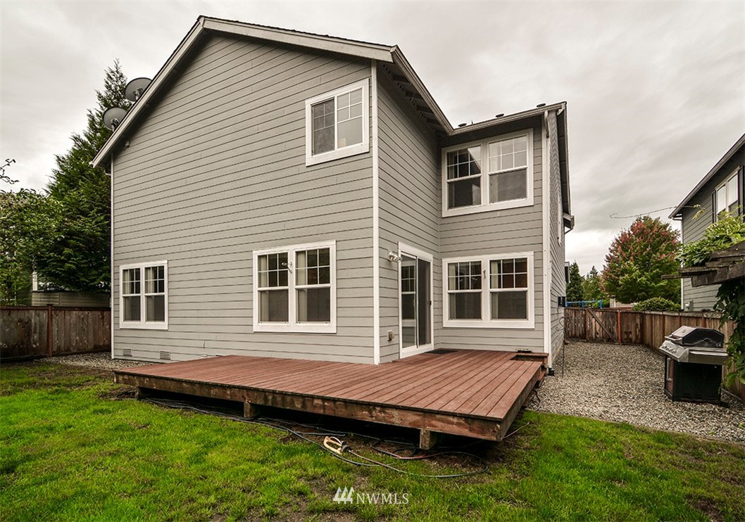 2402 Southeast 2nd Place Renton, WA 98056 - Photo 36 of 40 a view of a house with a yard and sitting area